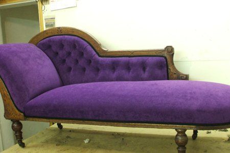 Purple buttoned chaise longue with dark wood frame, restored by M.D. Williams