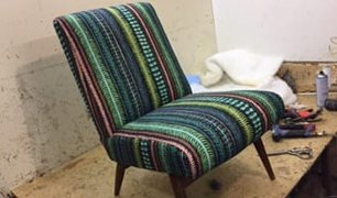 Modern armless lounge chair re-covered in bold striped fabric